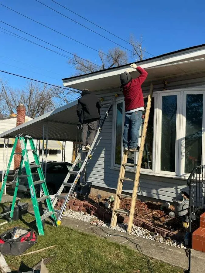 Restoration crew performing exterior repair in Fair Lakes