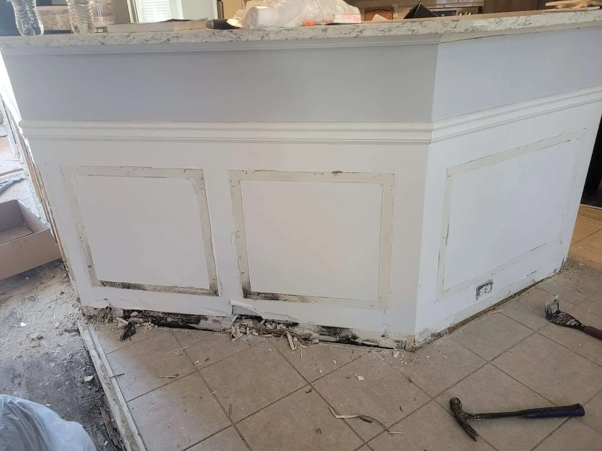 Water damage and mold on kitchen during Storm Damage Restoration in Fair Lakes